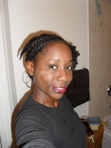 Here are the twists before I opened them. I don't know what that splotch is on my cheek -- I didn't see it in the mirror, but it showed up in all the pictures. Chupse.